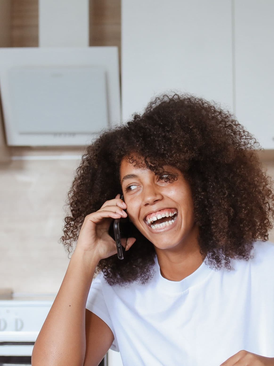 Friendly member of the Ousie support team answering a phone call